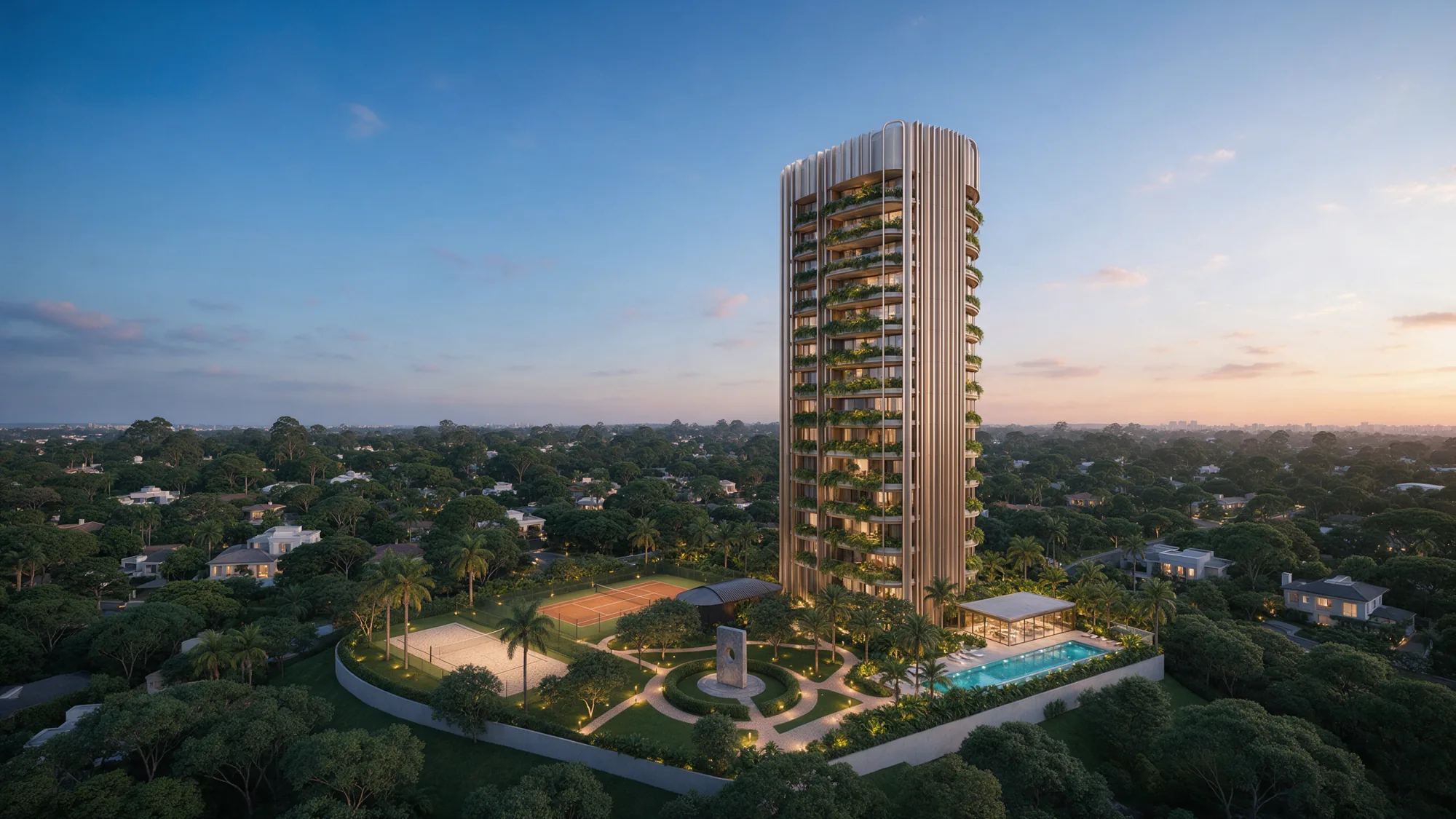 Vista aérea do ALTANA ao anoitecer: a torre iluminada sobre o platô ajardinado, com quadra de saibro, quadra de areia, piscina externa e praça de esculturas
